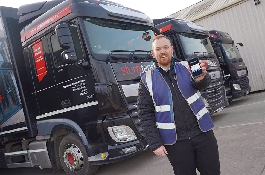 Sternfenster employee holding a device with Podfather on it