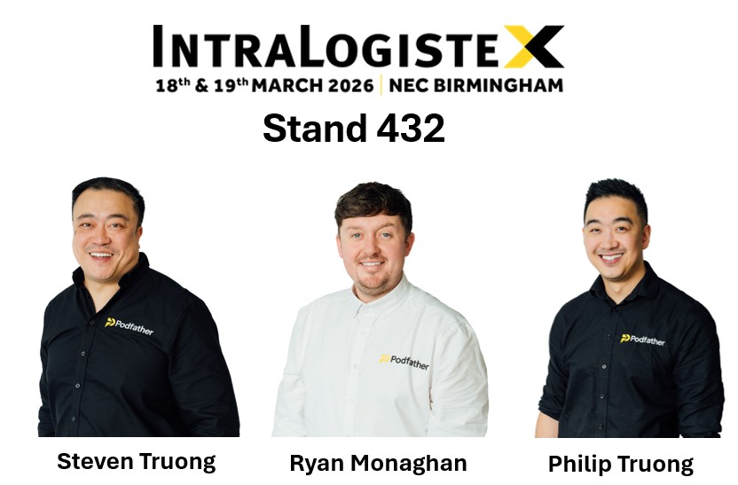 Three males wearing either black or white shirts